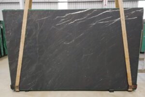Brownie Quartzite slab on display stand