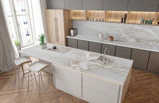 Modern kitchen with white marble stone countertop and island