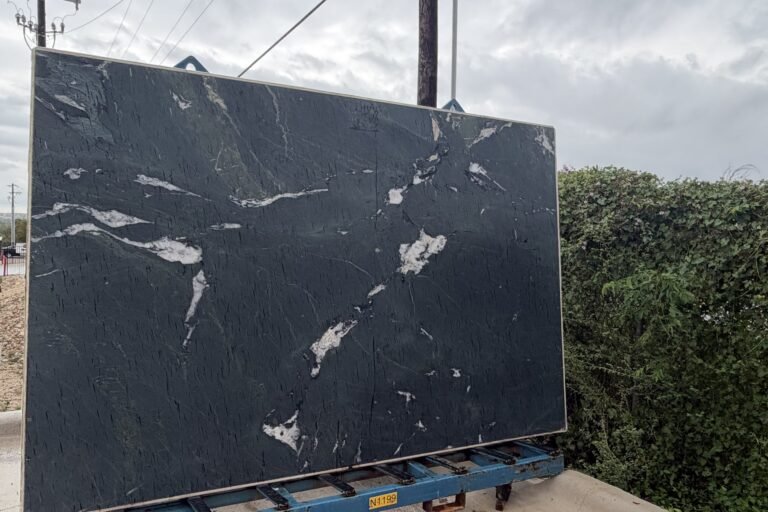 Black granite slab with bold white veining — KJM Stones, Buda TX