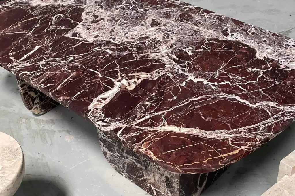 Handcrafted Rosso burgundy marble coffee table with white veining — KJM Stones, Buda TX